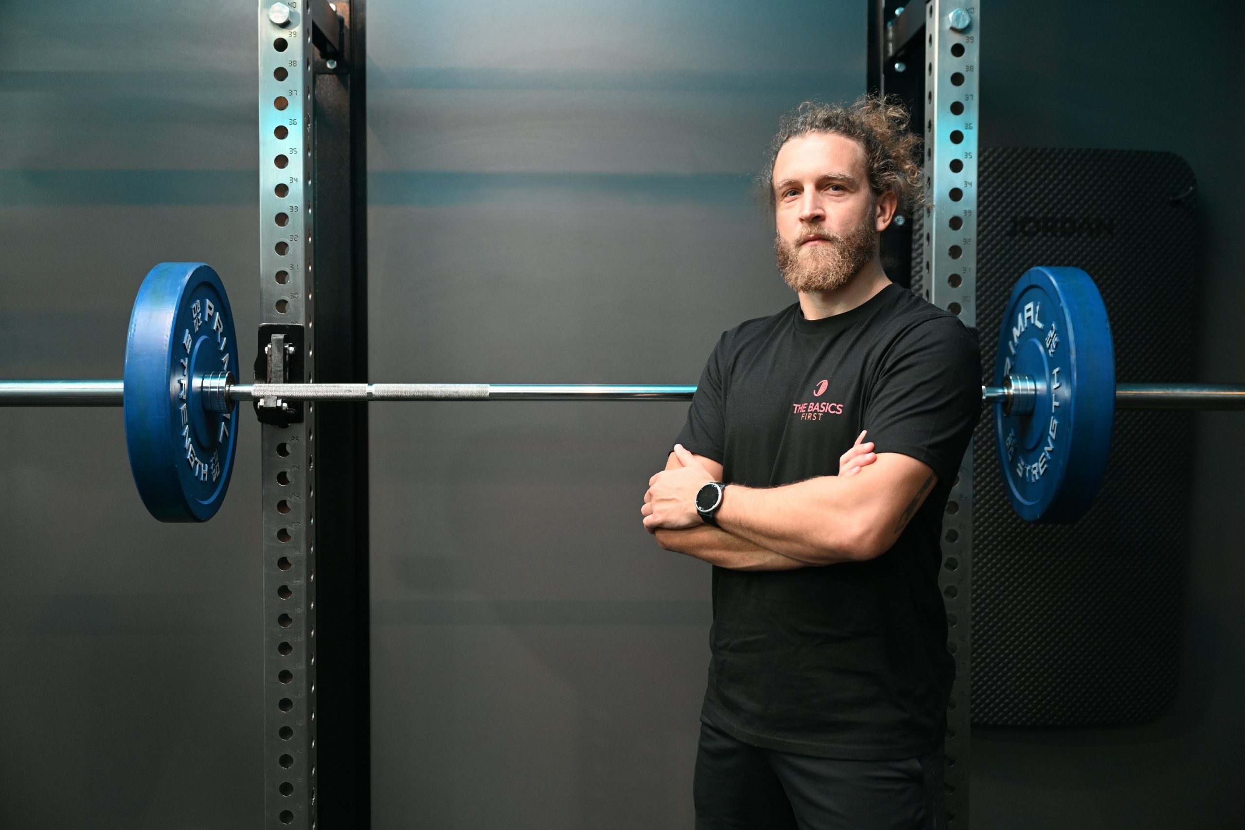 Osteopath and strength coach combining clinical expertise with barbell training